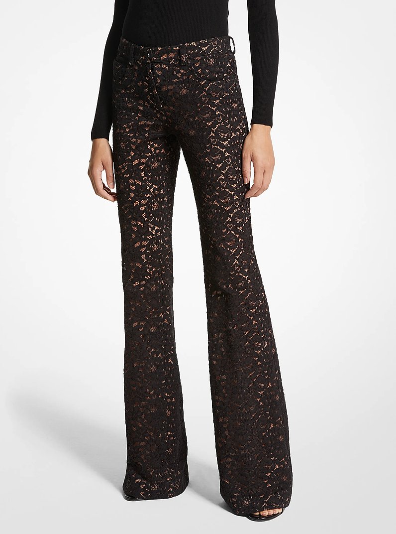 Jeans svasati in pizzo floreale cordonato in NERO | Michael Kors