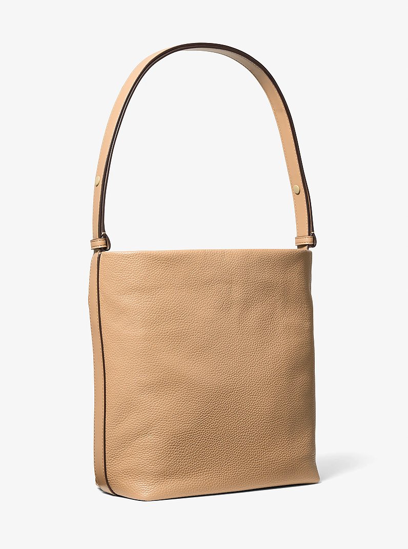 Roey Medium Pebbled Leather Bucket Messenger Bag in POIL DE CHAMEAU | Michael Kors