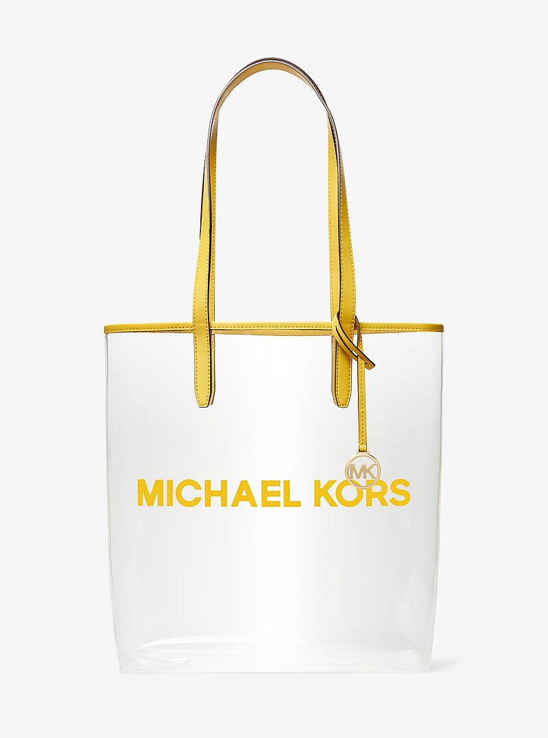 El bolso tote Michael grande de vinilo transparente in AMARILLO DORADO | Michael Kors