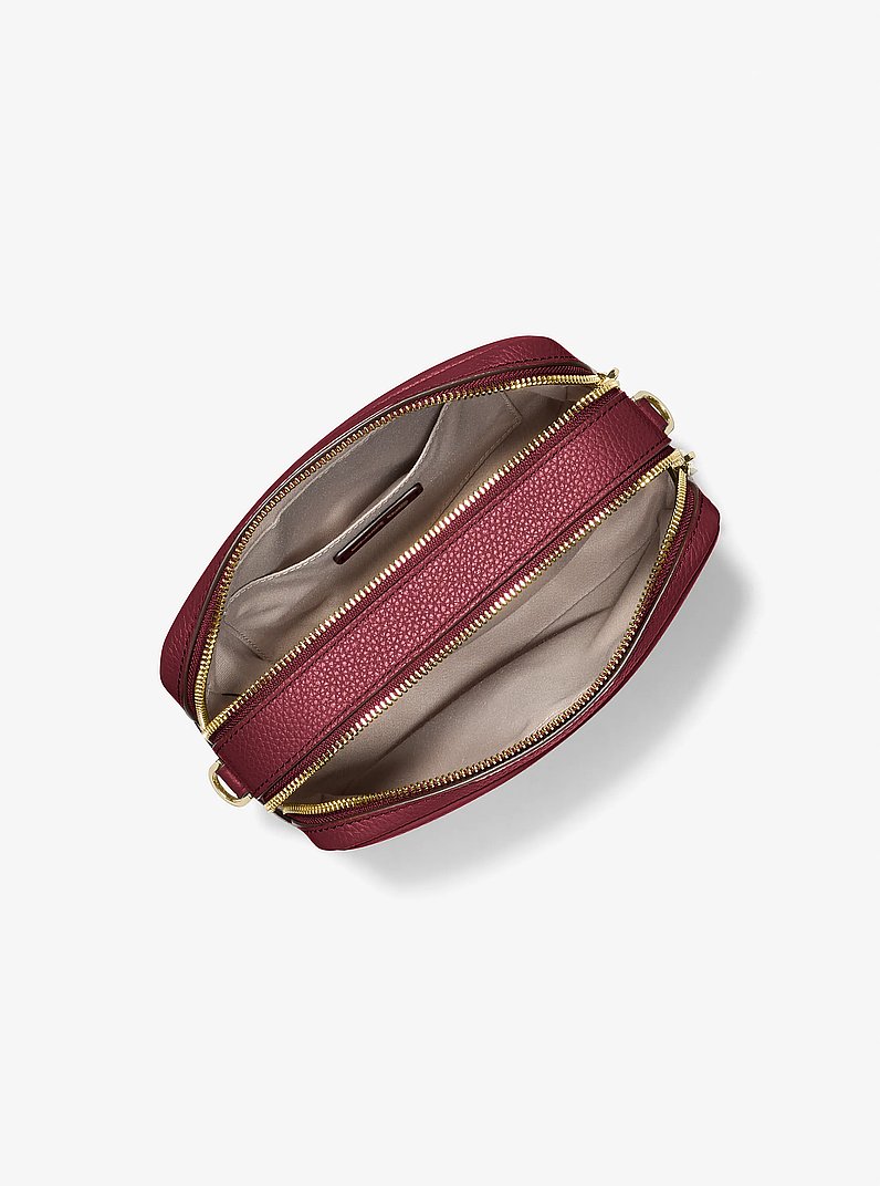 Camera bag a tracolla Bryant media in pelle martellata in ROSSO INTENSO | Michael Kors