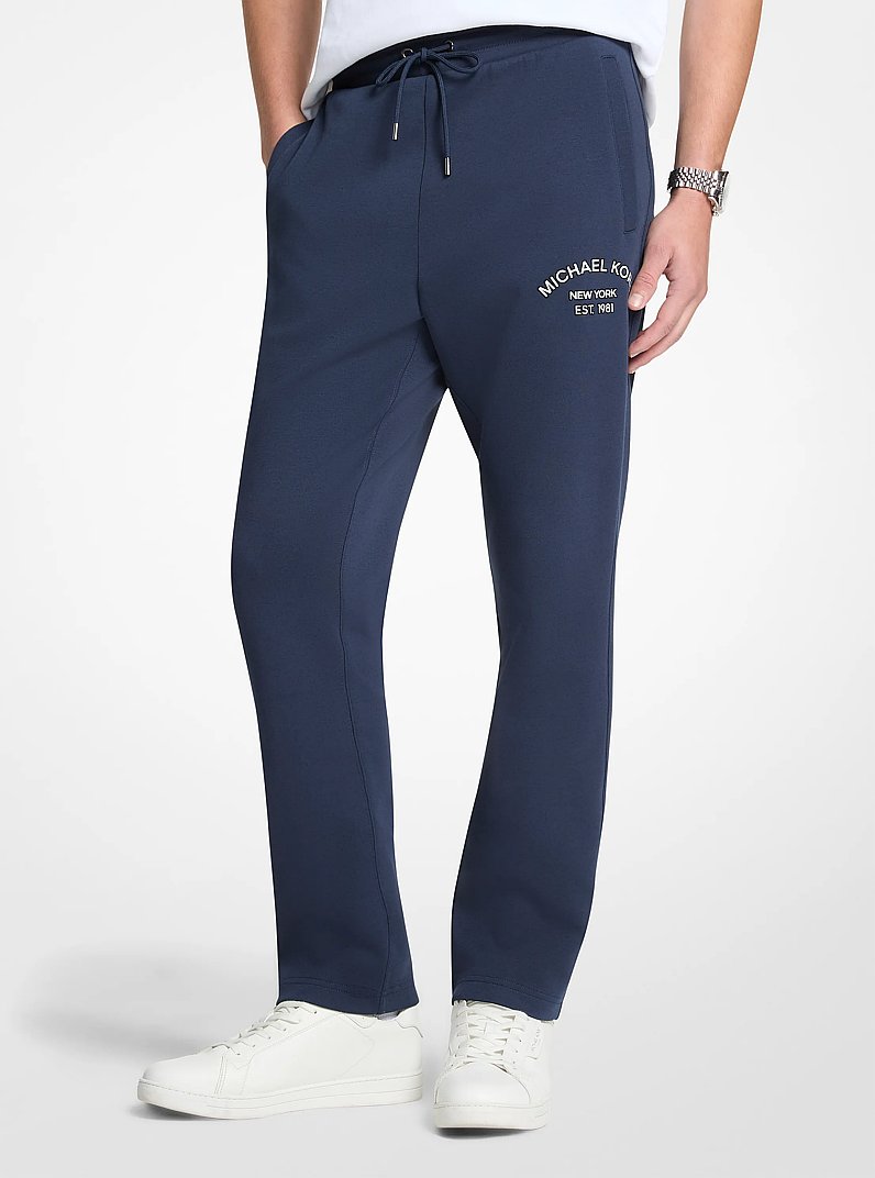 Pantalon tricot en m&eacute;lange de coton &agrave; logo in MINUIT | Michael Kors