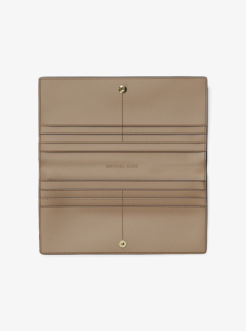 Grand portefeuille &agrave; bouton-pression Carson &agrave; logo m&eacute;tallis&eacute; et grav&eacute; in OR P&Acirc;LE | Michael Kors