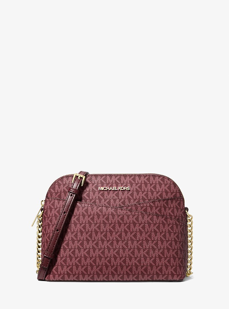 Sac &agrave; bandouli&egrave;re arrondi Jet Set Travel de taille moyenne &agrave; logo Signature in ROUGE POURPRE | Michael Kors