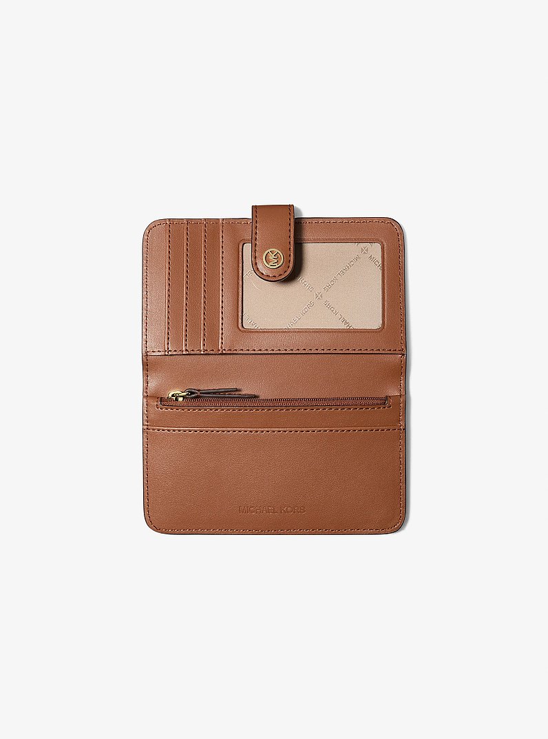 Jet Set Travel Medium Pebbled Leather Billfold Wallet in LUGGAGE | Michael Kors