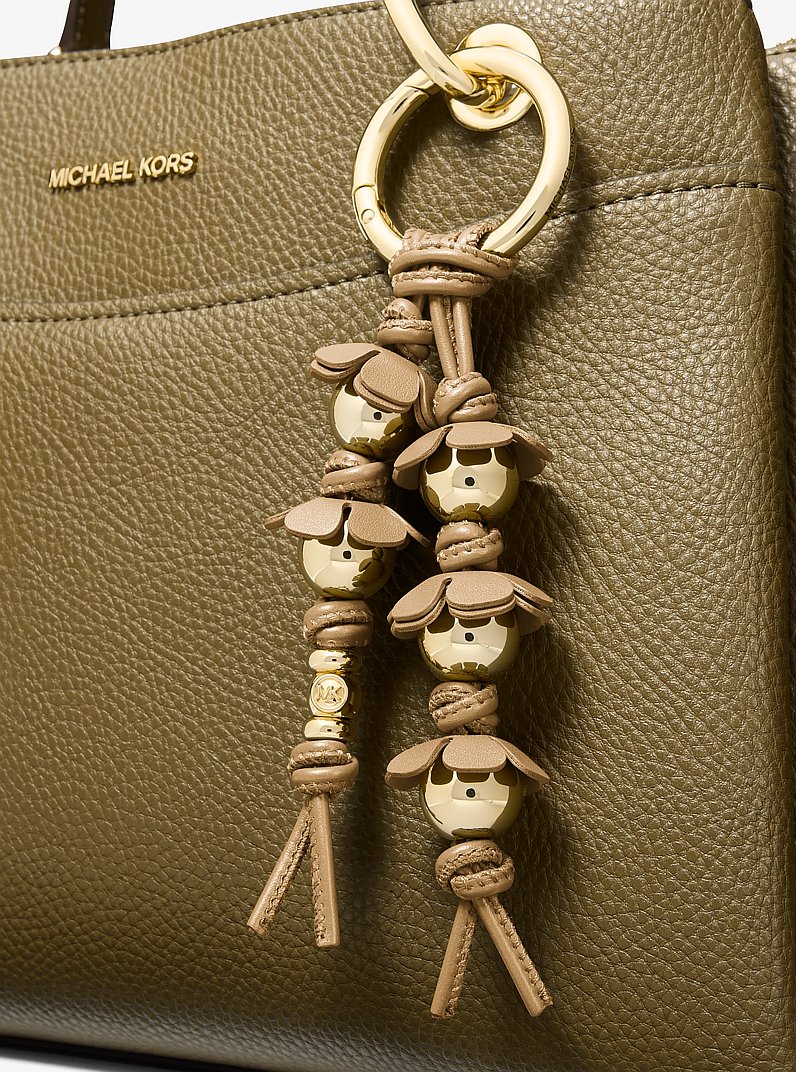 Taschenanh&auml;nger mit Zierblumen in KHAKI | Michael Kors