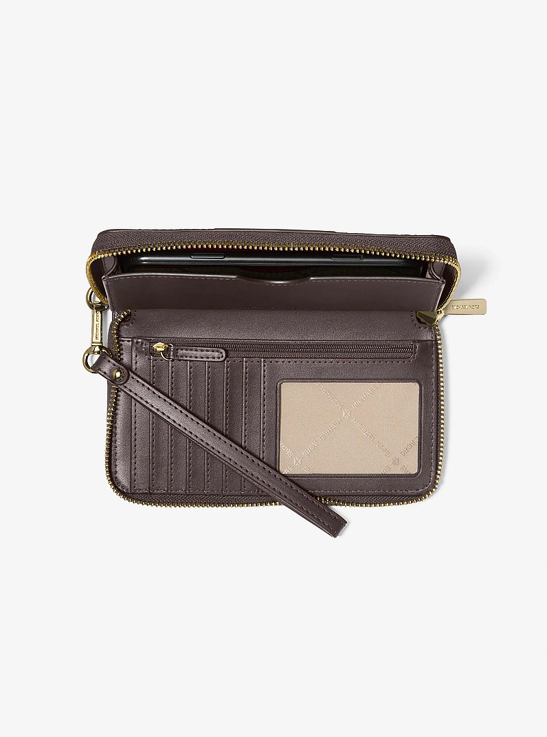 Jet Set Large Metallic Signature Logo Stripe Smartphone Wallet in MARR&Oacute;N | Michael Kors