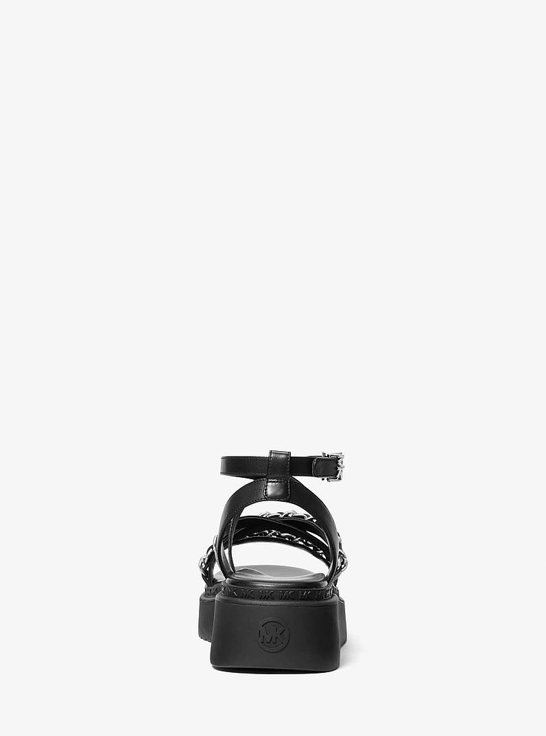 Sandalia Issi de piel con adornos y plataforma plana in NEGRO | Michael Kors