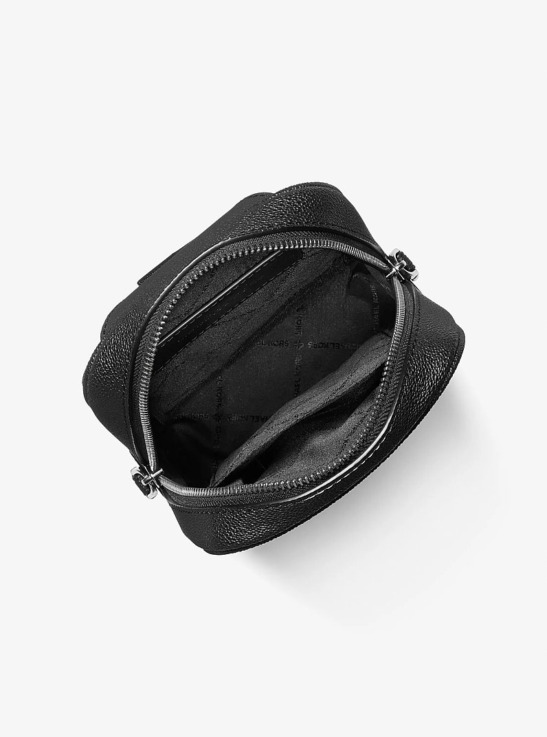 Cooper Medium KORS Logo Sling Pack in BLACK/WHITE | Michael Kors