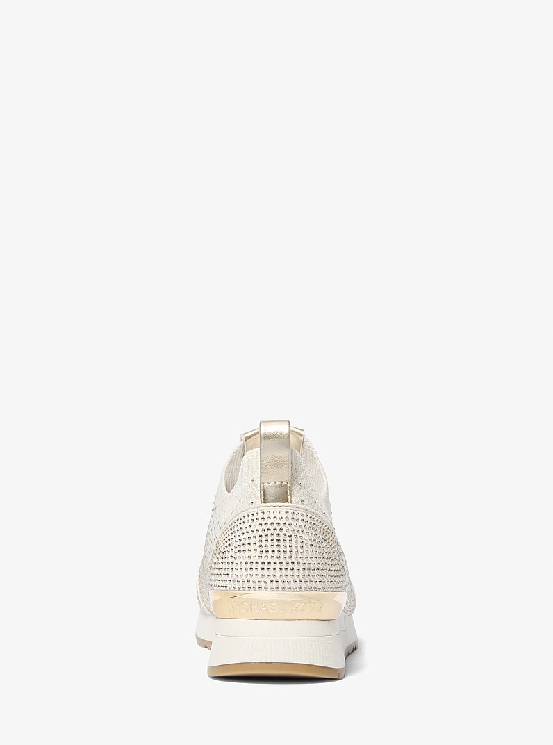 Zapatilla Jenkins de punto el&aacute;stico met&aacute;lica con adornos de cristal in DORADO P&Aacute;LIDO | Michael Kors