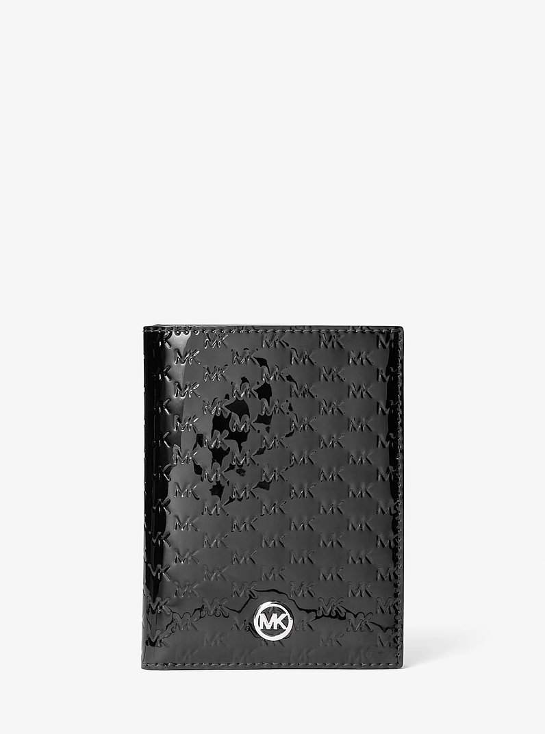 Jet Set Medium Patent Logo Debossed Passport Wallet in BLACK | Michael Kors