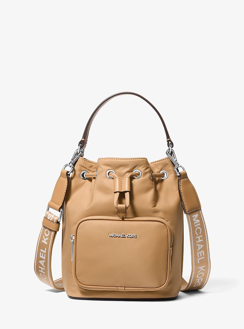 Khai Small Nylon Bucket Bag in PEANUT | Michael Kors