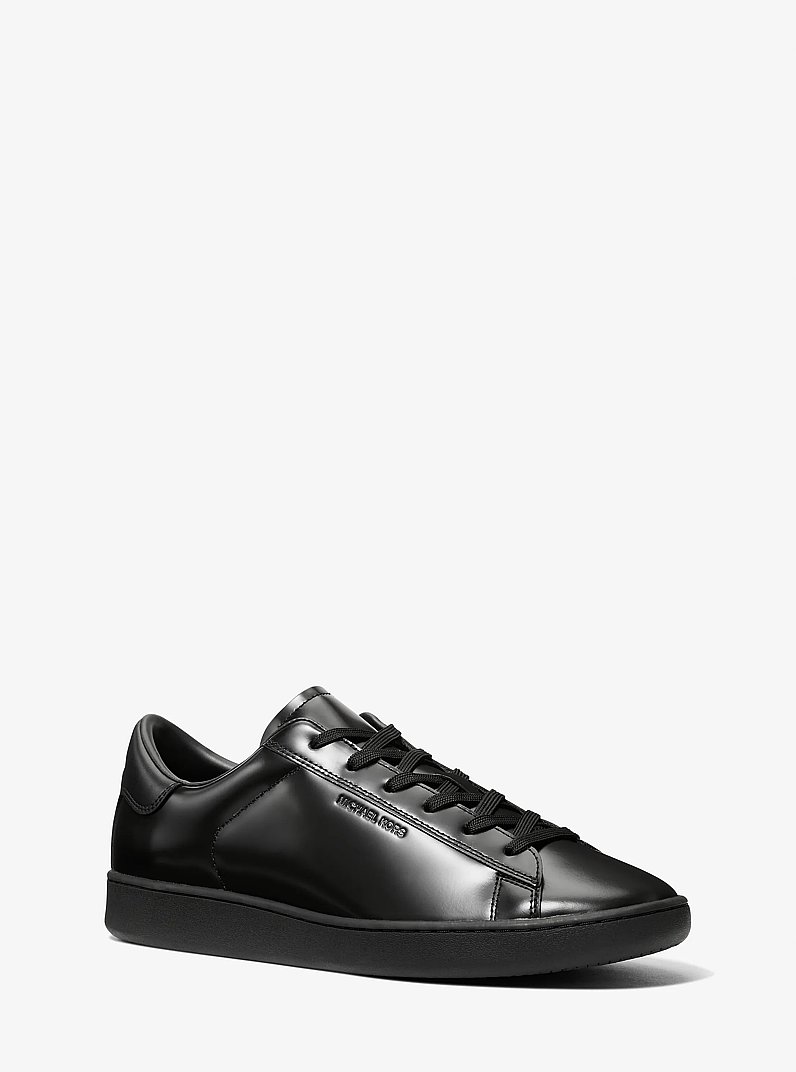 Reign Patent Leather Sneaker in BLACK | Michael Kors