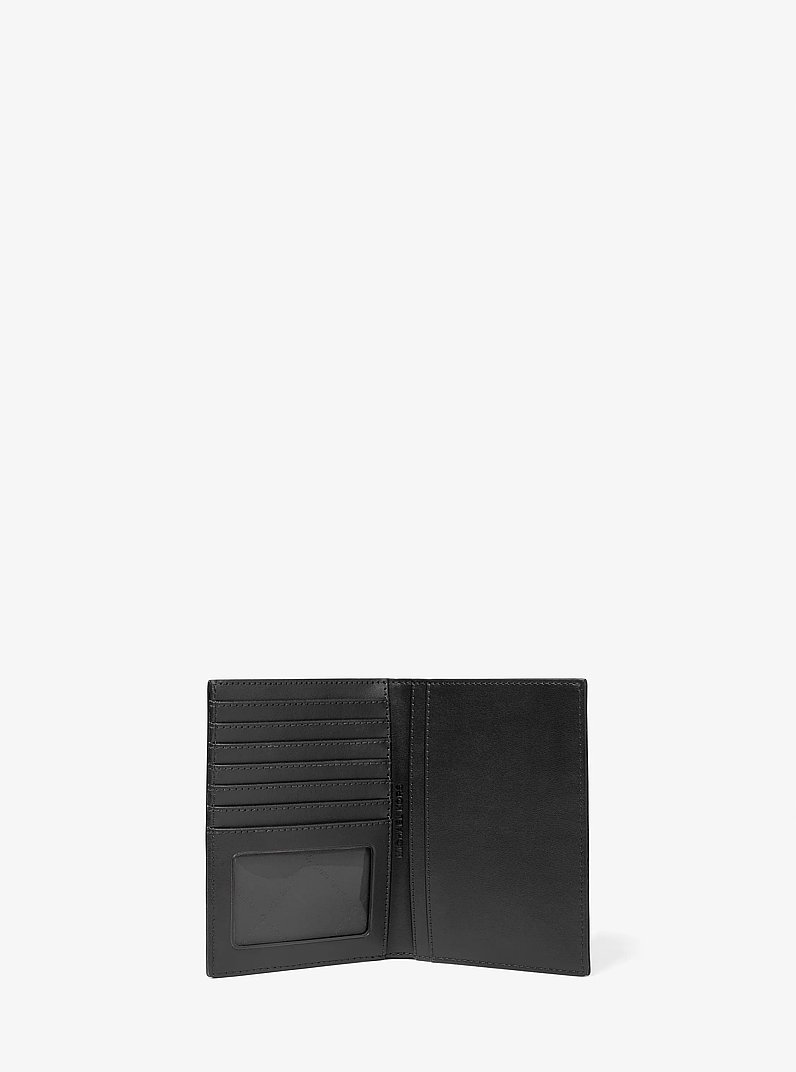 Jet Set Medium Patent Logo Debossed Passport Wallet in BLACK | Michael Kors