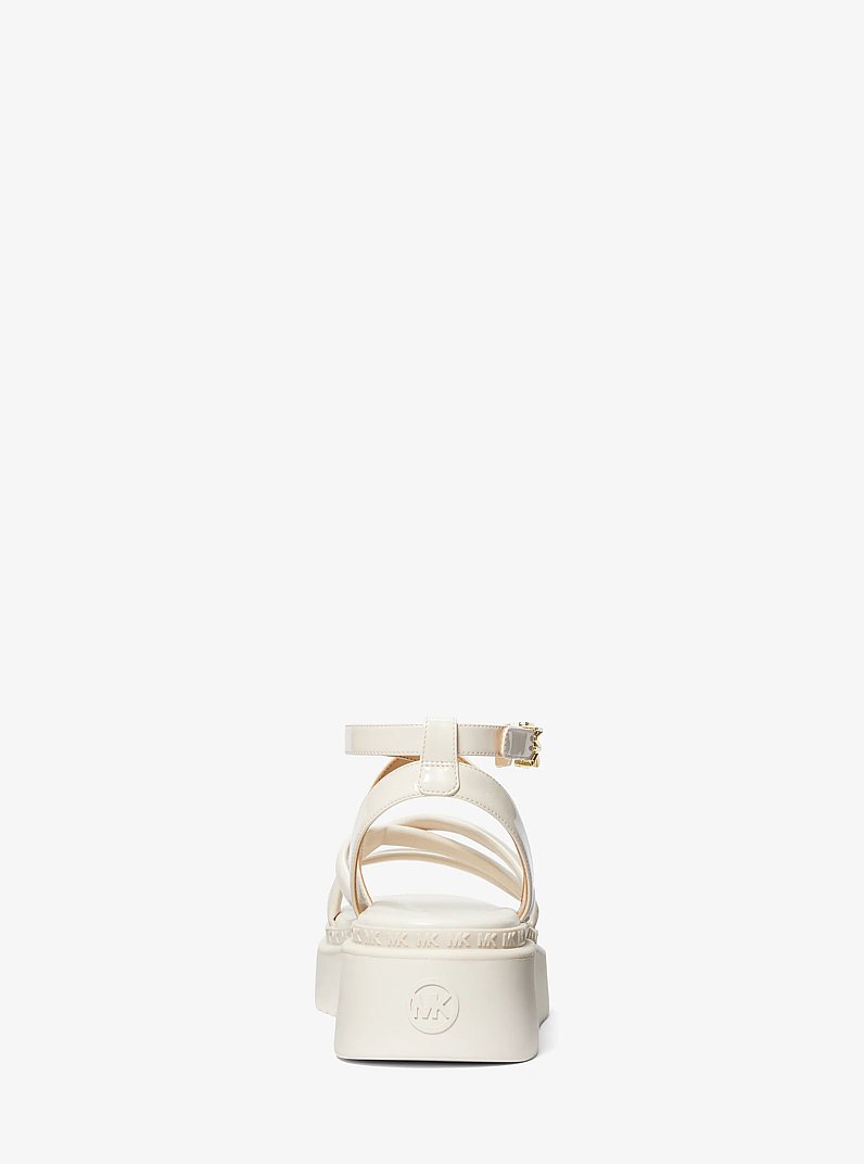 Sandalia Issa de charol sint&eacute;tico con plataforma entera in CREMA CLARO | Michael Kors