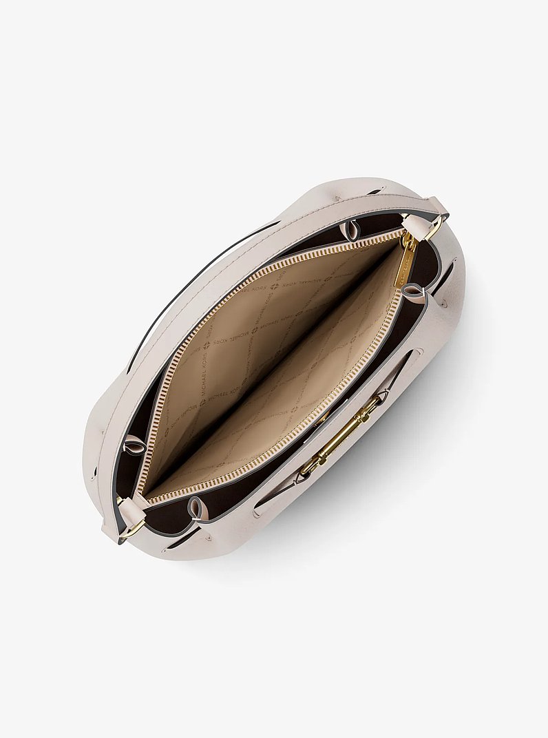 Bandolera Carson tipo bombonera convertible mediana de piel granulada in CREMA CLARO | Michael Kors