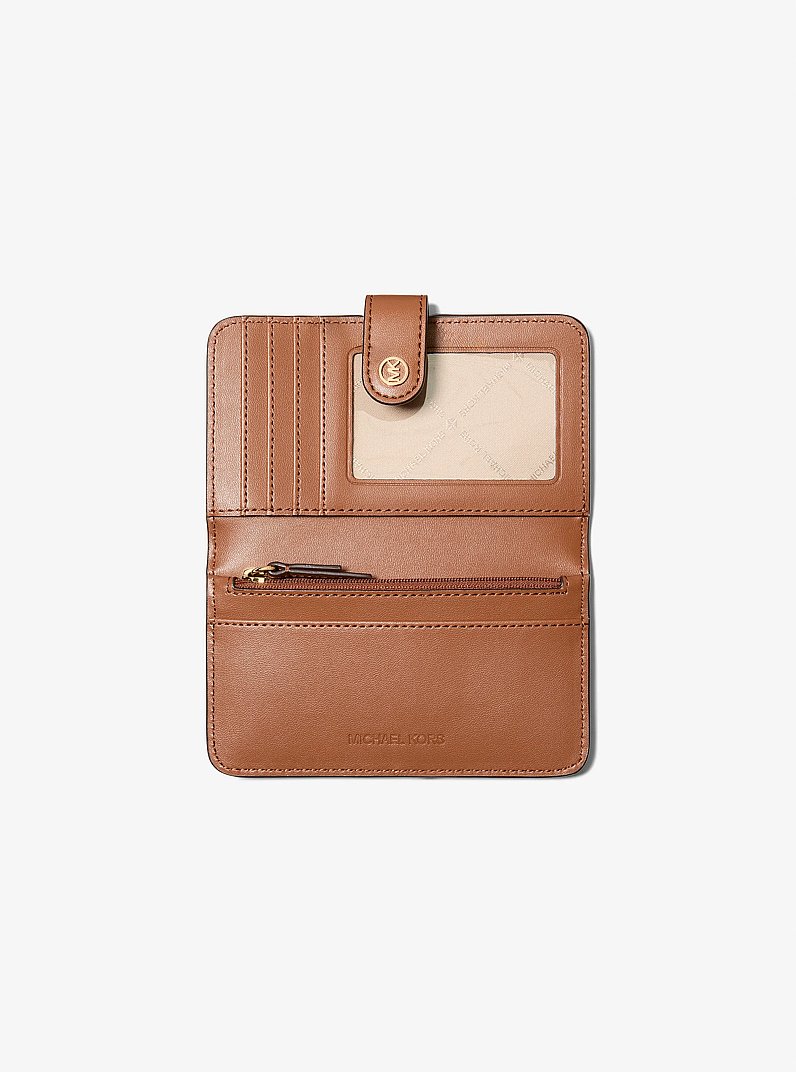 Billetera plegable Jet Set Travel mediana con logotipo exclusivo in MARR&Oacute;N | Michael Kors