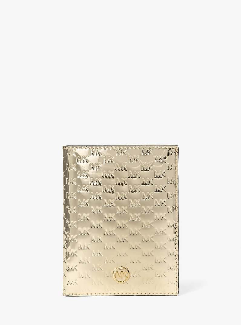 Jet Set Medium Metallic Logo Debossed Passport Wallet in PALE GOLD | Michael Kors