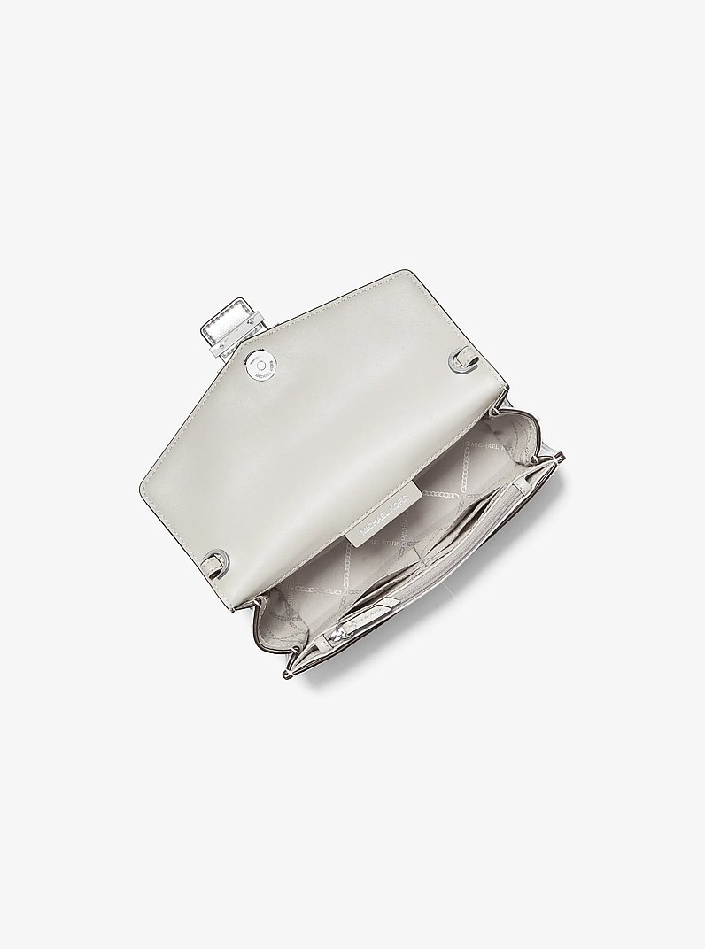 Penelope Medium Metallic Clutch in SILVER | Michael Kors