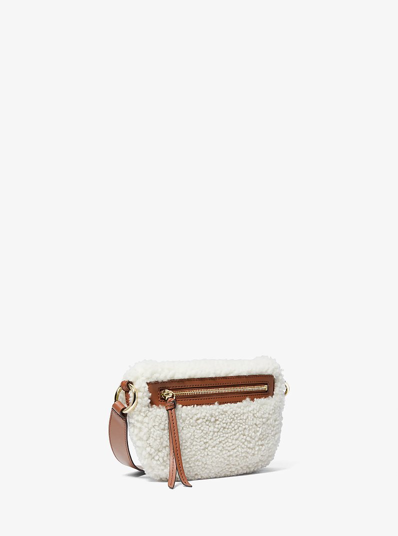 Bolsa de cintura em shearling Slater extrapequena
