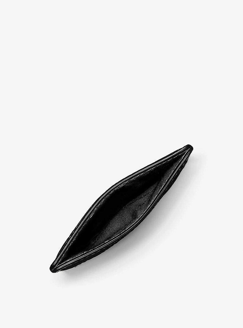 Tarjetero Reed grande de piel granulada in NEGRO | Michael Kors