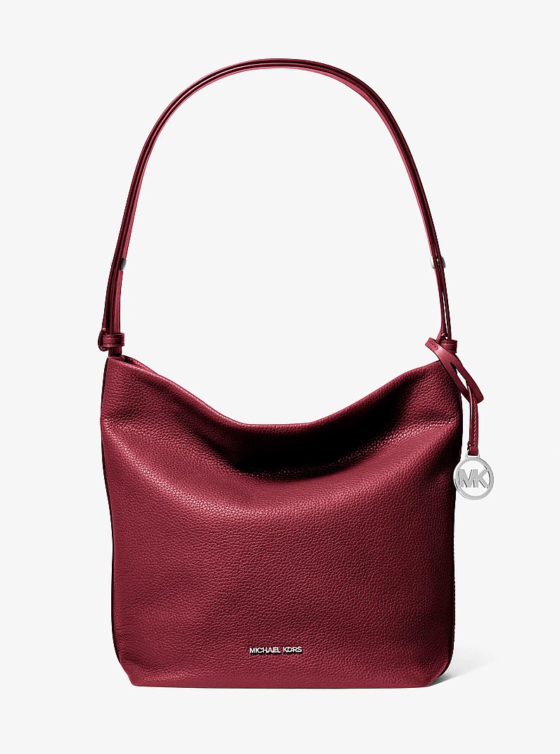 Roey Medium Pebbled Leather Bucket Messenger Bag in MAROON | Michael Kors
