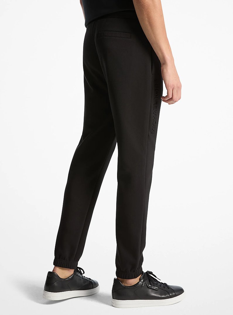 Logo Embossed Cotton Blend Joggers in BLACK | Michael Kors