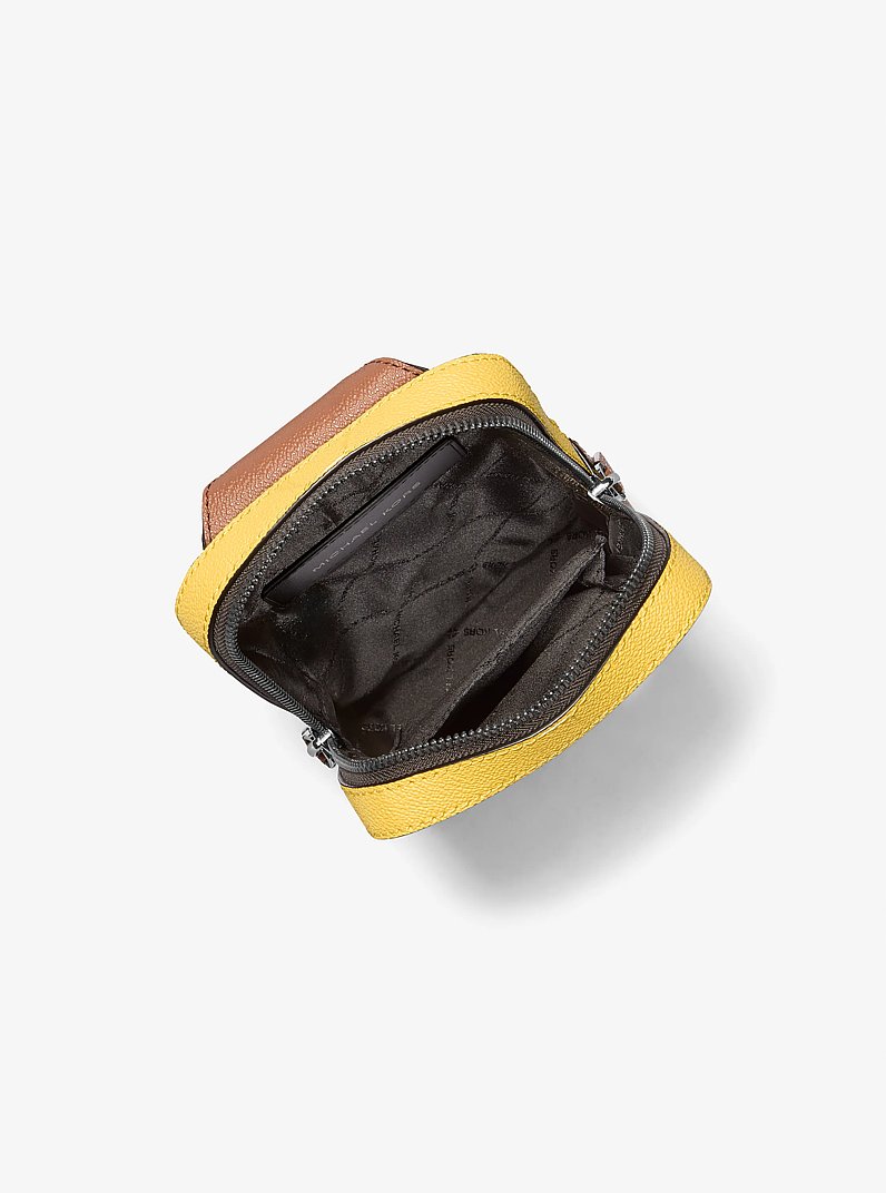 Cooper Signature Logo Sling Pack in DAISY YELLOW | Michael Kors
