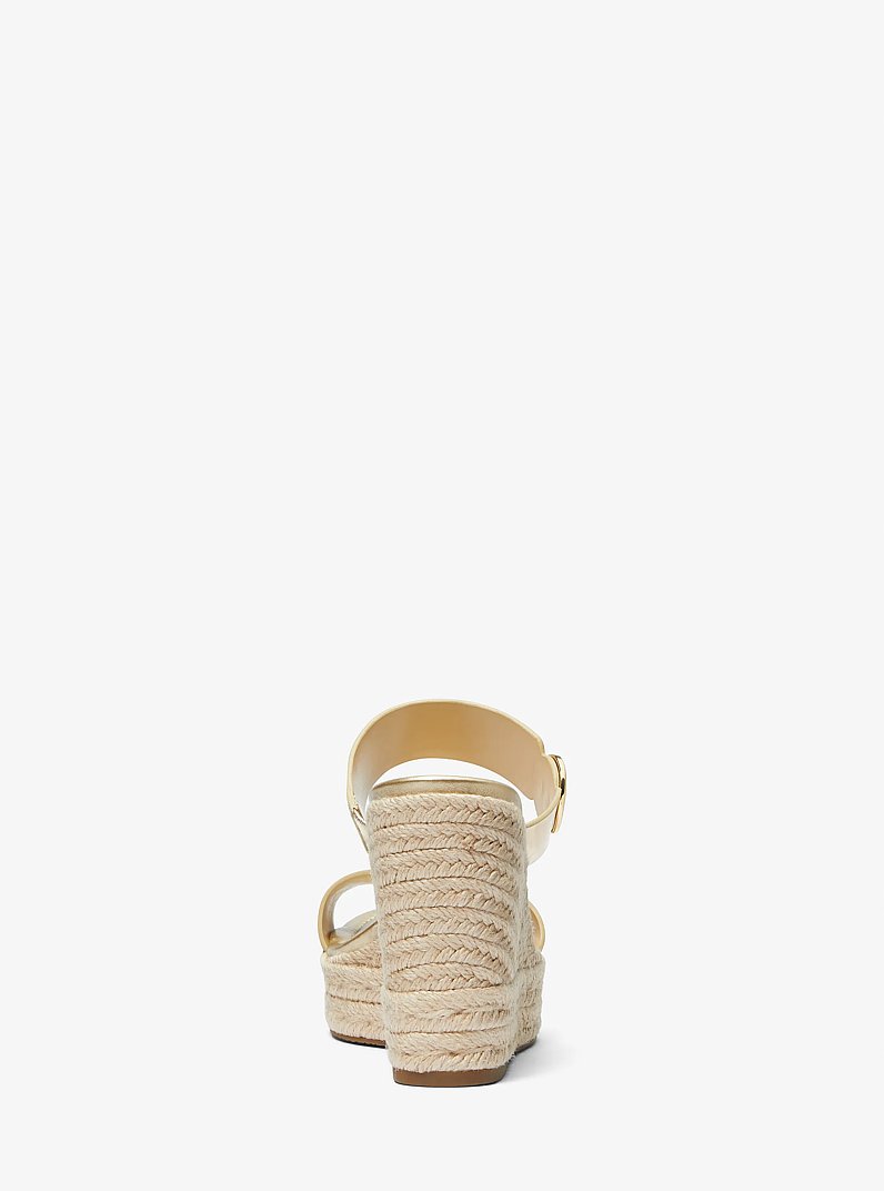 Lucinda Metallic Leather Wedge Sandal in PALE GOLD | Michael Kors