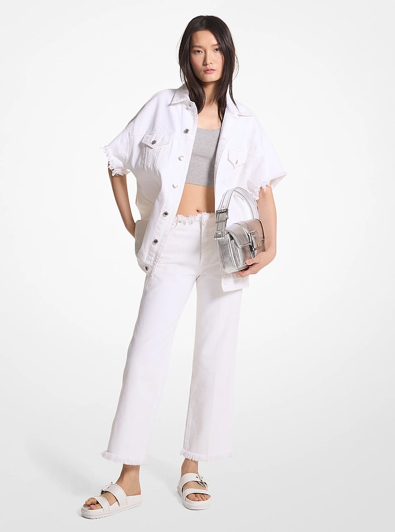 Giacca oversize in denim sfrangiato in BIANCO OTTICO | Michael Kors