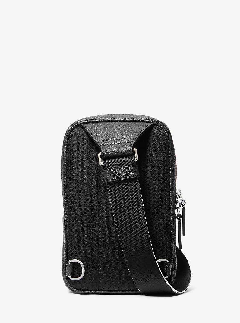 Cooper Medium KORS Logo Sling Pack in BLACK/WHITE | Michael Kors