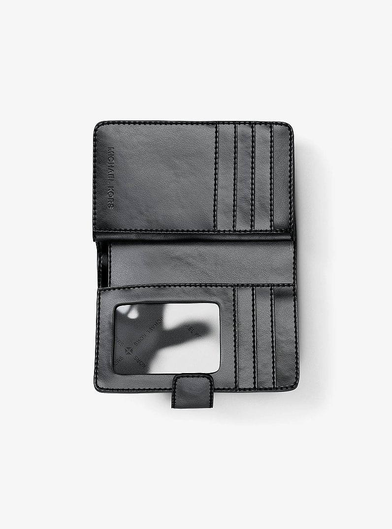 Portafoglio Jet Set Travel medio con stampa logo in NERO | Michael Kors