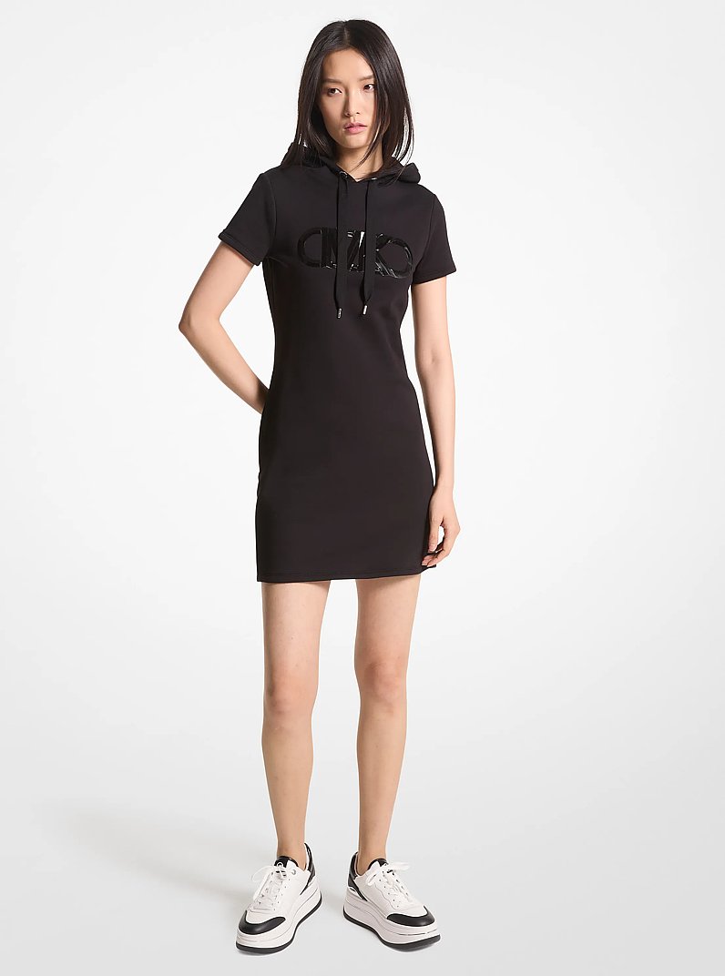Vestido de algod&oacute;n org&aacute;nico de rizo con logotipo imperio y capucha