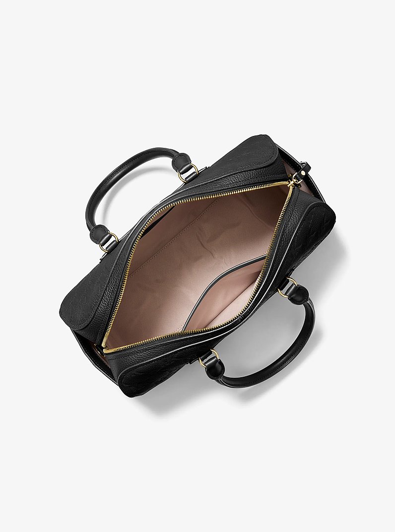 Borsone Jet Set Travel medio in pelle con logo goffrato e tracolla in NERO | Michael Kors