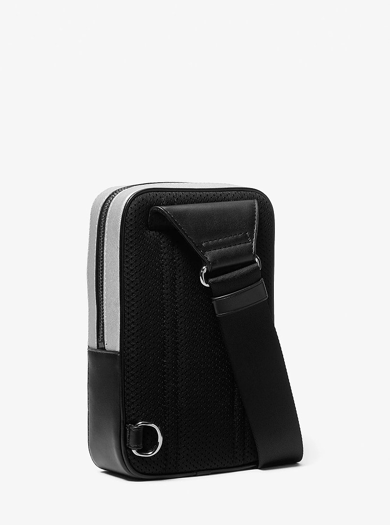 Cooper Medium Metallic Sling Bag in SILVER | Michael Kors