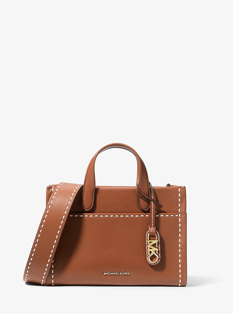 Petit sac messager Gigi en cuir orn&eacute; de surpiq&ucirc;res in LUGGAGE | Michael Kors