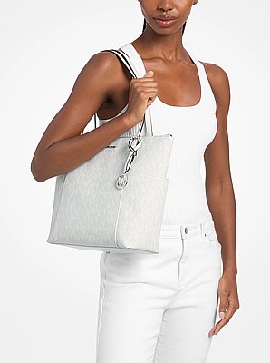 Draagtas Jet Set met kenmerkend logo en rits aan de bovenkant, middelgroot