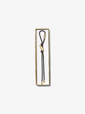 Initial Gold-Tone and Speckled Cord Bag Charm in 18K GOLD | Michael Kors image number 1
