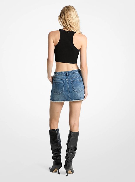 Mini-jupe en denim effiloch&eacute;