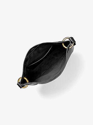 Bandolera mediana Tate de piel con borlas