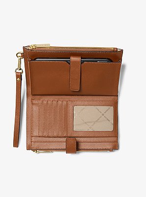 Grande pochette &agrave; dragonne Jet Set pour t&eacute;l&eacute;phone intelligent en cuir in LUGGAGE | Michael Kors image number 1