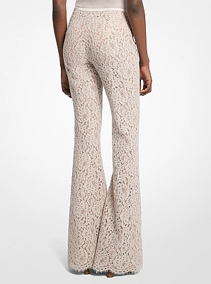 Pantalones acampanados con encaje floral y cordones