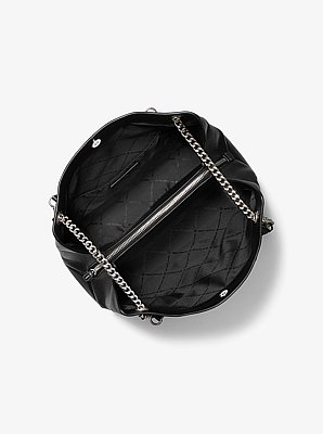 Bolso mensajero Christina mediano de piel granulada