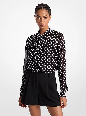 Blusa in georgette a pois con colletto a nastro