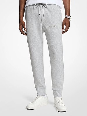 Joggers en mezcla de algod&oacute;n con logotipo en relieve