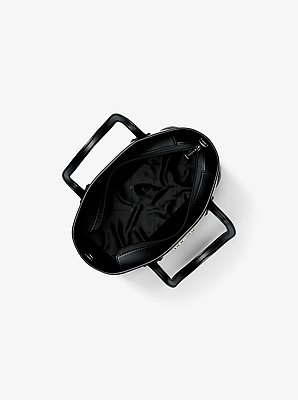 Bandolera Eva extrapeque&ntilde;a convertible con logotipo exclusivo