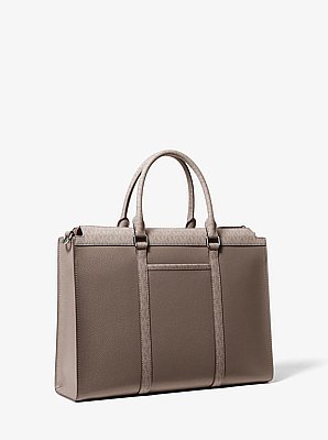Malet&iacute;n Cooper de piel granulada con logotipo exclusivo