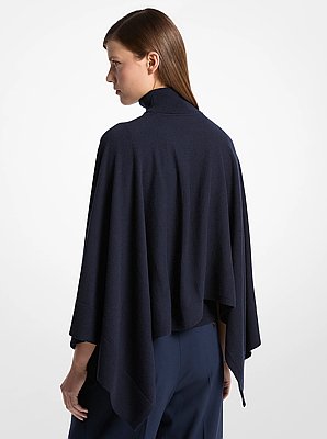 Top tipo caft&aacute;n drapeado de cachemira con cuello de tortuga