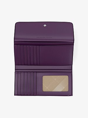 Billetera Jet Set grande plegable de piel saffiano