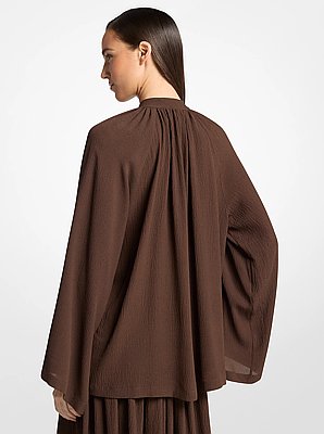 Blusa poeta de seda seersucker