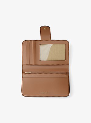 Mittelgro&szlig;e Brieftasche aus gekrispeltem Leder in Blockfarben mit MK&nbsp;Pop-Detail